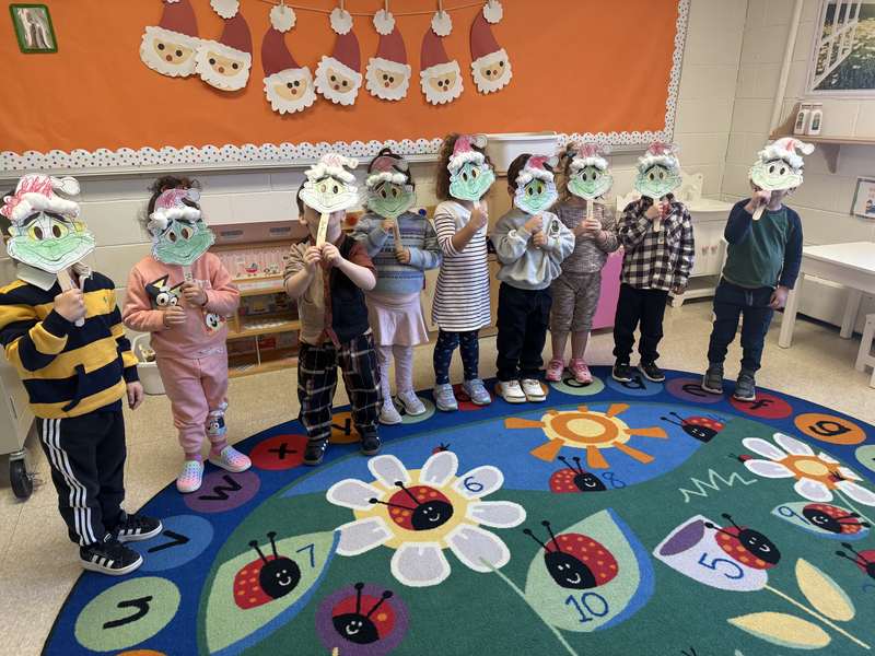 Children and teachers celebrating a special school event