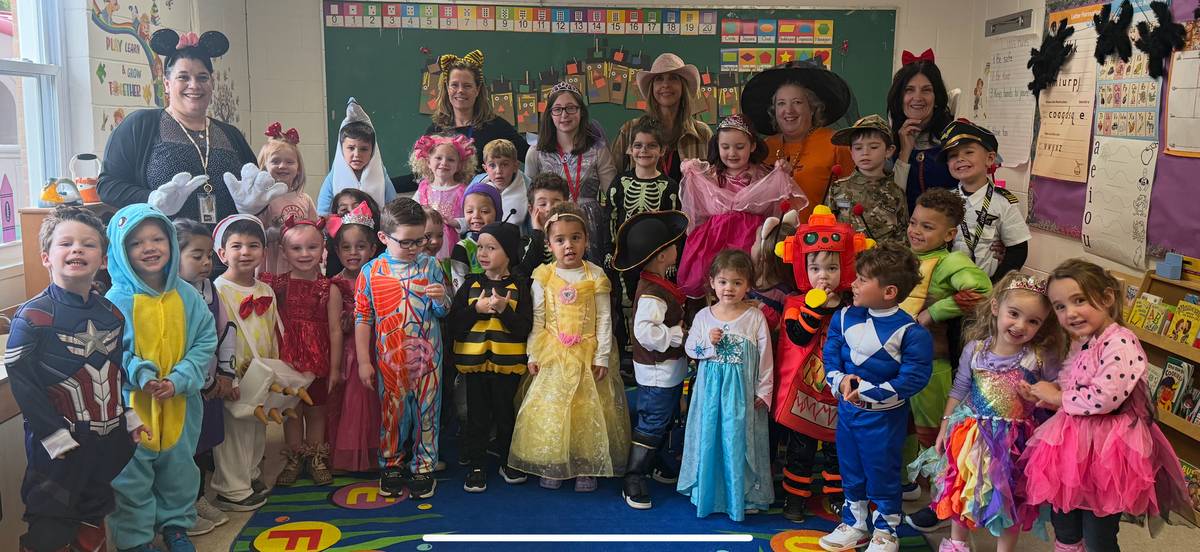 Humpty Dumpty students and teachers dressed in costumes for the Halloween Parade